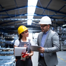 manager-supervisor-worker-discussing-about-production-results-new-strategy-factory-industrial-hall